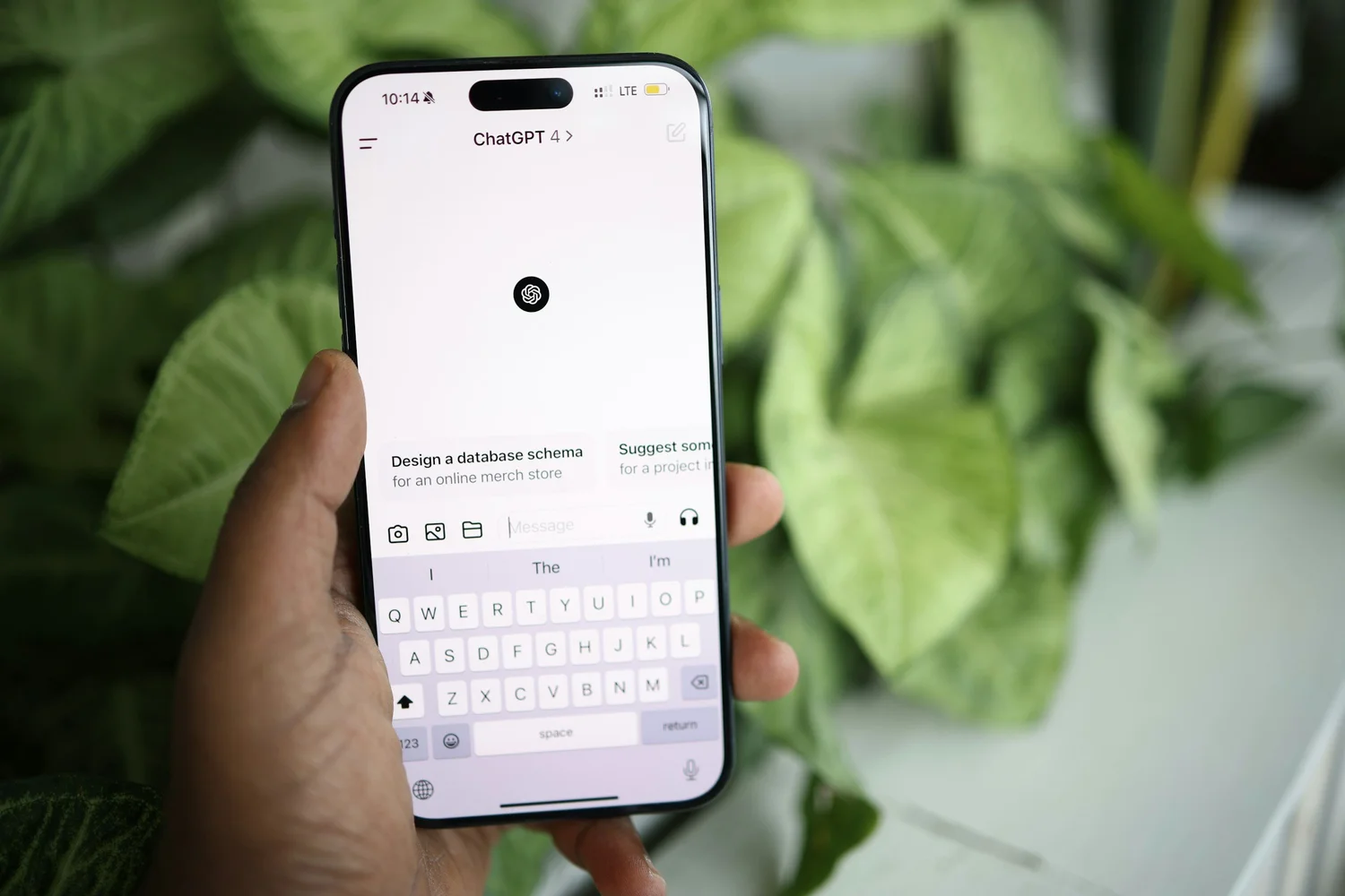 A person using ChatGPT on a phone